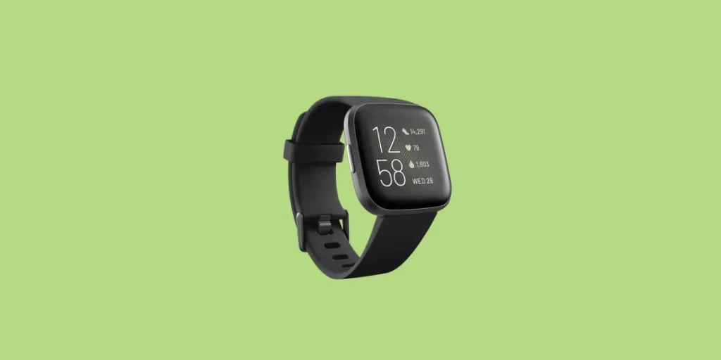 how to reset time on fitbit versa